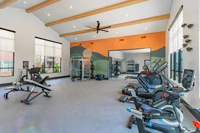 a gym with several treadmills and exercise bikes at Landing Incredible 2BD Clubhouse Gym in Longmont
