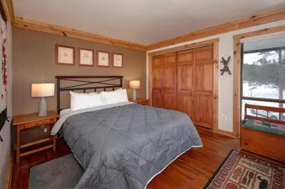 a bedroom with a bed and a window at Wild Irishman 2 bed 1 and half bath WIGK in Keystone