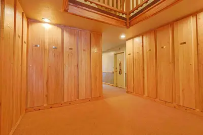 a room with wooden lockers in a house at Wild Irishman 2 bed 1 and half bath WIGK in Keystone