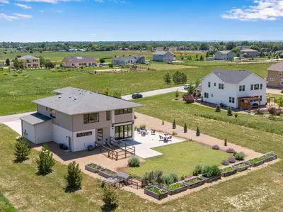 an aerial view of a house with a large yard at Perfectly Between Boulder- Estes in Longmont