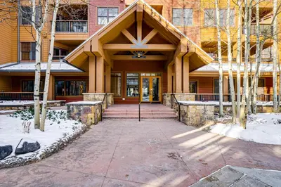 a large building with a wooden roof at Walk to Gondola! Keystone Gem in River Run Village in Keystone