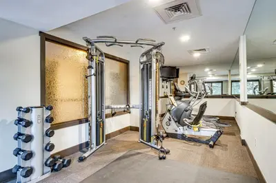 a fitness room with a gym with tread machines at Walk to Gondola! Keystone Gem in River Run Village in Keystone