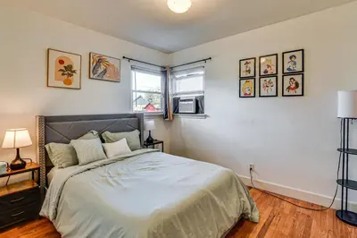 a bedroom with a bed and a window at 7 Mi to Dtwn Denver Pet-Friendly Home with Yard in Aurora