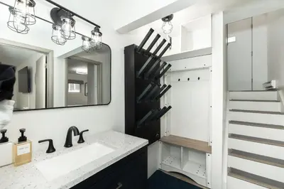 a bathroom with a sink and a mirror at Cozy Winter Park Ski & Bike Retreat in Winter Park