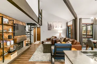 a living room with a couch and a table at Wild Irishman 1029 - Keystone in Dillon