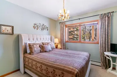 a bedroom with a large bed and a window at Lakepoint 807C - Frisco in Frisco