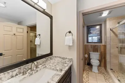 a bathroom with a sink and a toilet at Lakeshore 1535 in Keystone