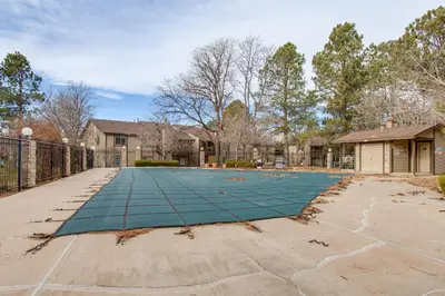 a tennis court in a driveway of a house at 3 Mi to Buckley Convenient Condo in Aurora in Aurora