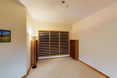 an empty room with a closet and a window at Tenmile Vista Retreat in Silverthorne