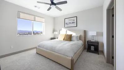 a bedroom with a bed and a ceiling fan at Landing Incredible 1BD Gym Clubhouse in Littleton