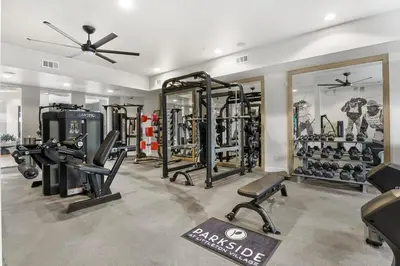 a gym with several treadmills and exercise equipment at Landing Incredible 1BD Gym Clubhouse in Littleton