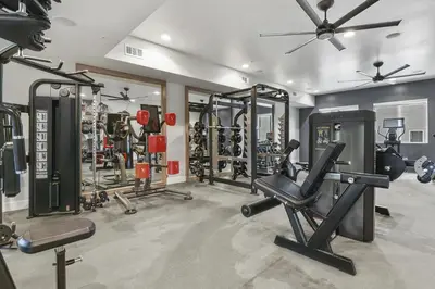 a gym with several treadmills and other gym equipment at Landing Incredible 1BD Gym Clubhouse in Littleton