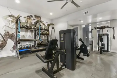 a fitness room with a gym with a treadmill at Landing Incredible 1BD Gym Clubhouse in Littleton