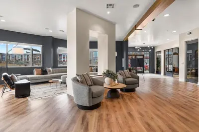 a living room with couches and chairs and a table at Landing Incredible 1BD Gym Clubhouse in Littleton