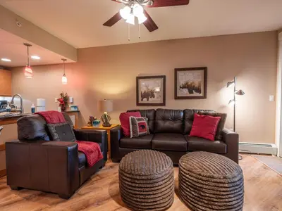 a living room with a couch and two chairs at Fraser Crossing 1BR Condo | Hot Tub Access + Walk to Lifts in Winter Park