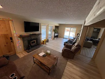 an aerial view of a living room with a fireplace at Summit Mountain Escape in Silverthorne