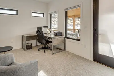 a home office with a desk and a chair at 1 Mi to Granby Ranch Luxe Home with Mtn Views! in Granby