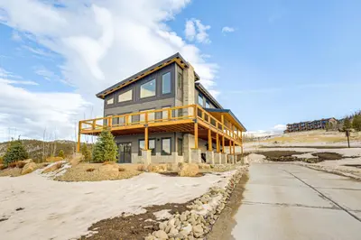 a house under construction on a sandy road at 1 Mi to Granby Ranch Luxe Home with Mtn Views! in Granby