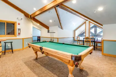 a room with a pool table in it at Walk to Ski Lift and Hot Tubs! Mtn-View Keystone Gem in Keystone