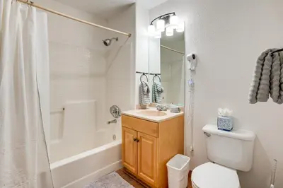 a bathroom with a toilet and a sink and a shower at Walk to Ski Lift and Hot Tubs! Mtn-View Keystone Gem in Keystone