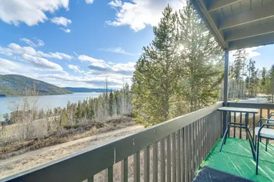a porch with a view of a lake at Ski, Hike and Snowmobile Mtn-View Grand Lake Gem! in Grand Lake