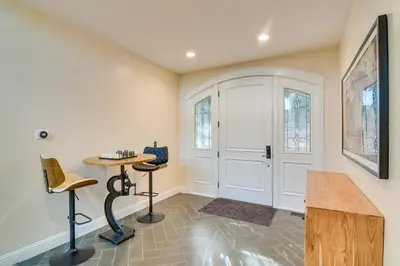 a home bar with a table and two chairs at Great for Gatherings! Evergreen Getaway with Hot Tub in Evergreen