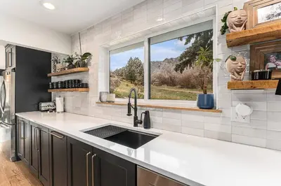 a kitchen with a sink and a window at Spa Getaway with Open Space Access Sauna & Hot Tub & Cold Plunge in Boulder