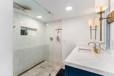 a white bathroom with a sink and a shower at Spa Getaway with Open Space Access Sauna & Hot Tub & Cold Plunge in Boulder