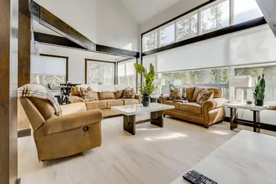 a living room with couches and tables and windows at Keystone 5BD 5 5BT Luxury Remodel 2025 & Pets in Keystone