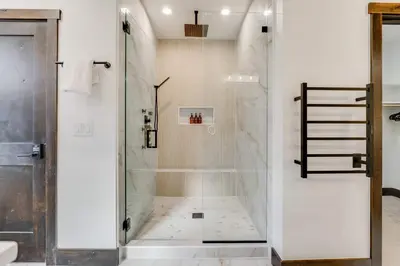 a shower with a glass door in a bathroom at Keystone 5BD 5 5BT Luxury Remodel 2025 & Pets in Keystone
