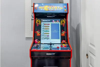 a video game machine with a game screen at New Listing 3BR Frisco Condo - Ski and Bus Access in Frisco