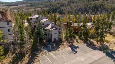 an aerial view of a house with a parking lot at New Listing 3BR Frisco Condo - Ski and Bus Access in Frisco