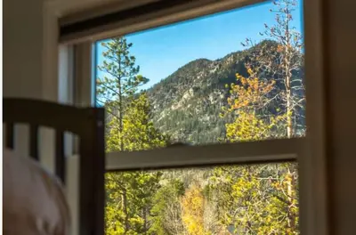 a window with a view of a mountain at New Listing 3BR Frisco Condo - Ski and Bus Access in Frisco