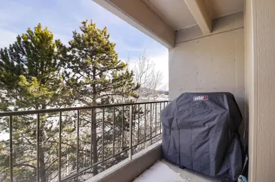 a balcony with a bag sitting on the ledge at 317 Lodge at Lake Dillon condo in Dillon