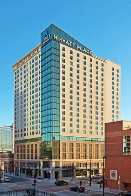 a large building with the hyatt place sign on it at Hyatt Place Denver Downtown in Denver