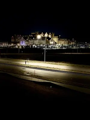 a city at night with street lights and buildings at New Vacation Home 8 min walking distance from Gaylord Hotel in Aurora