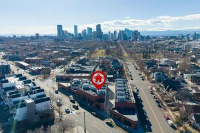 an aerial view of a city with a city skyline at Bright 1BR Office, Attached Garage & Fast WiFi in Denver