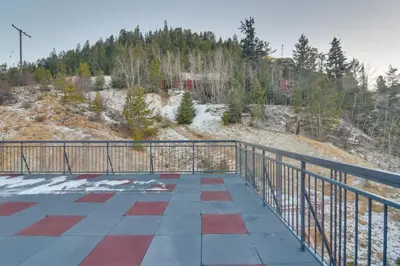 a balcony with a railing with a view of a mountain at Steps to Casinos and Shuttle! Central City Home Base in Central City