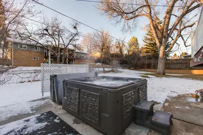 a tv sitting on the ground in the snow at 2 Mi to Old Town Pet-Friendly Home Base in Arvada in Arvada