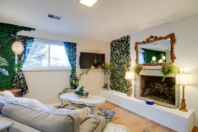 a living room with a couch and a fireplace at Work and Play Near Old Town Arvada Pets Welcome! in Arvada