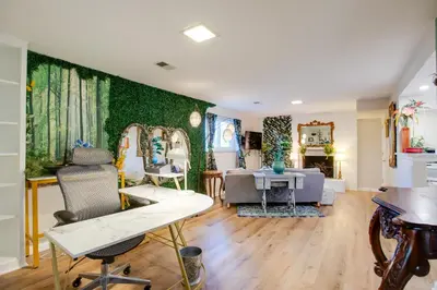 a room with green walls with chairs and mirrors at Work and Play Near Old Town Arvada Pets Welcome! in Arvada