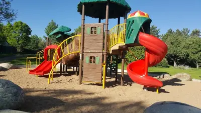 a playground with a slide in the sand at Renovated 2BR flat near Red Rocks-Rocky Mt-DT-15min in Golden