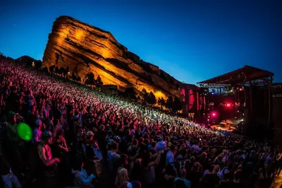 a large crowd of people at a concert at night at Renovated 2BR flat near Red Rocks-Rocky Mt-DT-15min in Golden