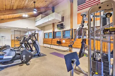 a gym with two treadmills and two ellipticals at 4 Mi to Slopes! Breck Mtn Base with Hot Tub Access in Breckenridge