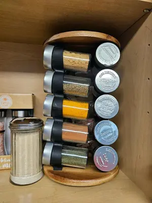 a group of different colored paint bottles in a drawer at Stylish Denver Apartment Near Downtown Sleeps 4 in Denver