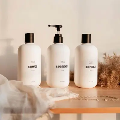 three bottles of shampoo and conditioner sitting on a table at Lakefront - Trails - Skiing - Views - Georgetown in Georgetown