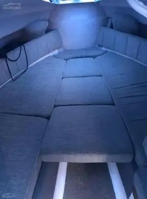 a bed in the back of a boat at Yougeen in Denver
