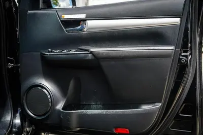 a door of a car with the door open at Yougeen in Denver
