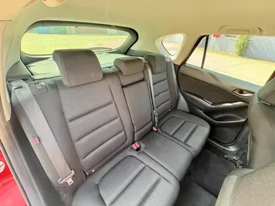 a back seat of a car with the back seats folded at Yougeen in Denver