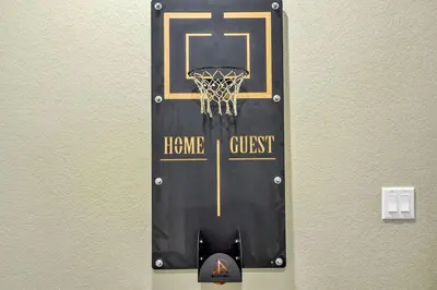 a door with a basketball hoop with the words home crust at Family Friendly 5BR Mountain Views & Game Room in Superior